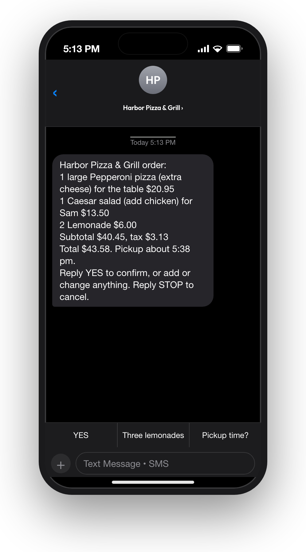 The confirmation text on a phone: the order with the total and the pickup time, and the caller's YES
